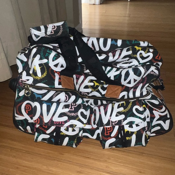 PINK Victoria's Secret Handbags - RARE Victoria's Secret pink travel duffle bag with hand pull with love graffiti